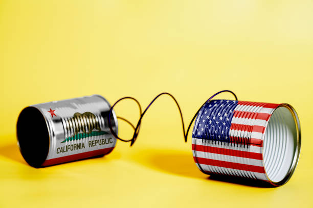 istock tin can phone with USA and California U.S. state Flags. communication concept 1083091378