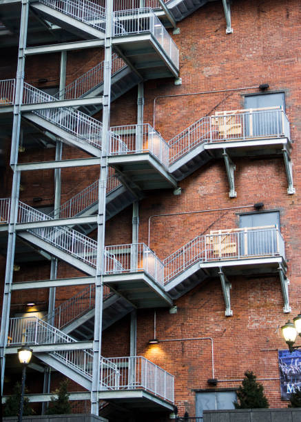 istock fire escape staircase on the side of a brick building 1083091676
