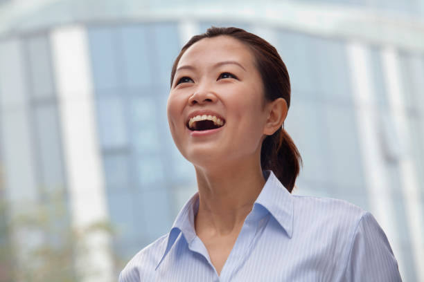 istock Cheering Chinese businesswoman 1083094220