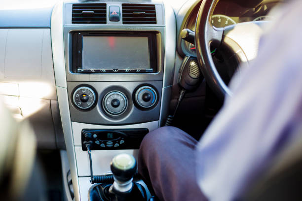 istock Selective focus of man driving a taxi 1083094274