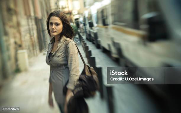 Goodbye Series Pensive Young Woman Stock Photo - Download Image Now - Traffic, Blurred Motion, Bus