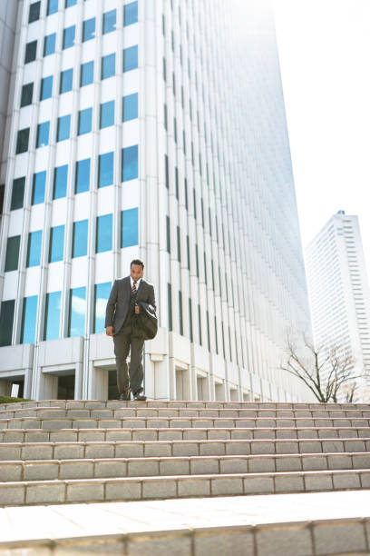istock busy businessman running in tokyo 1083098310