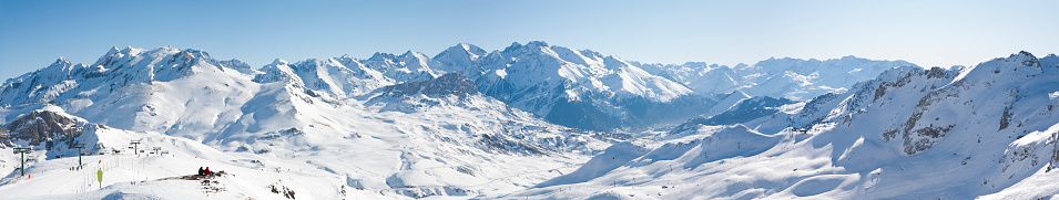 This landscape photo was taken in Europe, in France, Rhone Alpes, in Savoie, in the Alps, in winter. We see the mountains of the Mont Blanc massif, under the Sun.
