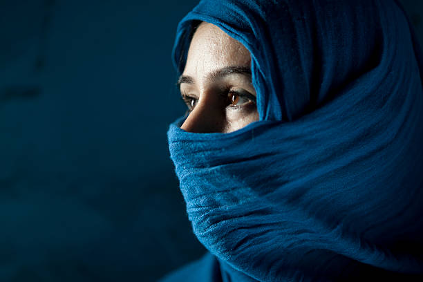 istock Woman Behind Blue Veil On Blue Background 108310140