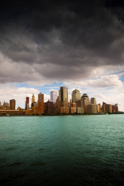 Dark rain clouds over World Trade Center buildings\n[url=/search/lightbox/7017035][IMG]http://farm3.static.flickr.com/2540/4008616250_4108b7faba.jpg[/IMG][/url]