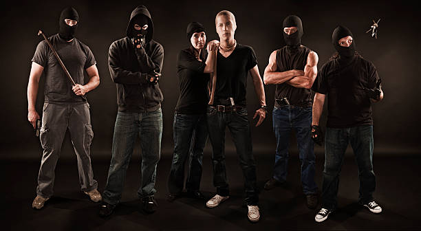 Gang of Robbers  gang stock pictures, royalty-free photos & images