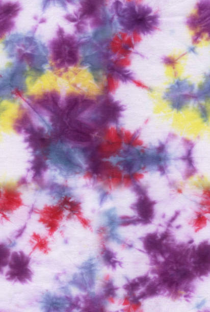 istock Abstract seamless tie-dye hand painted fabric background with irregular floral spots 1083107448