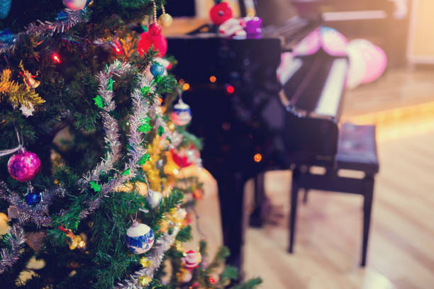 istock Piano and Christmas tree for christmas holiday background 1083108380