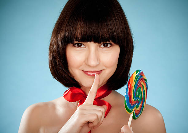istock Young woman with lollipop 108310959