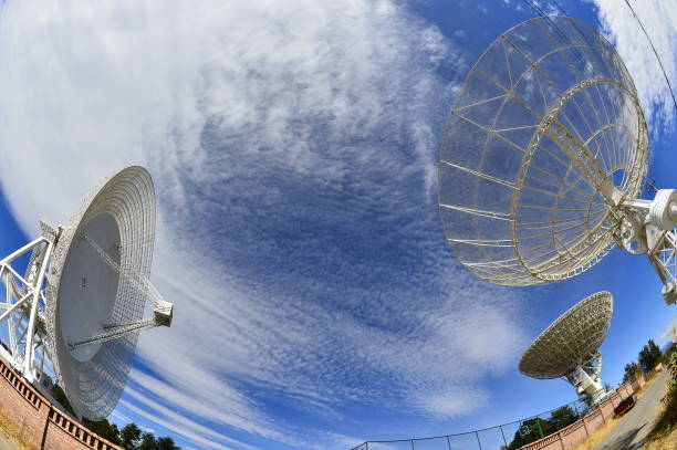 istock Array of satellite dishes or radio antennas against sky. Space observatory. 1083112810