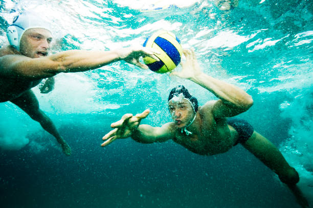 water-polo - floating on water swimming pool men water fotografías e imágenes de stock