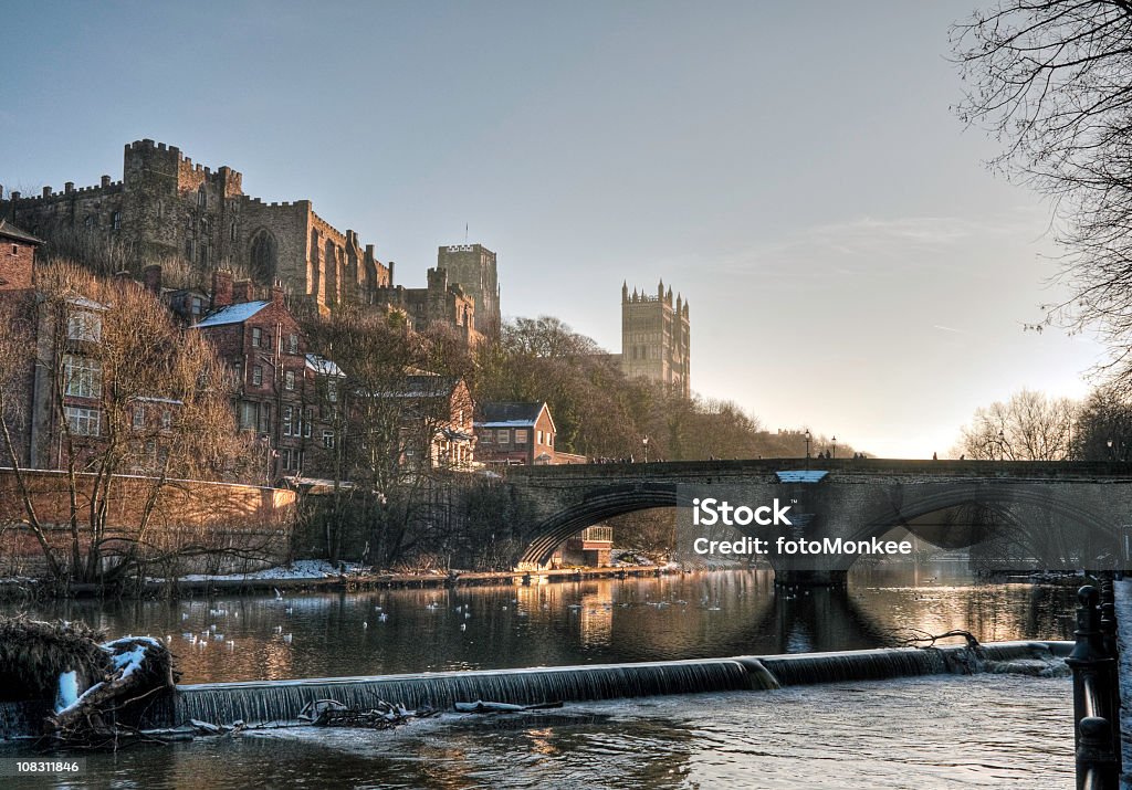 HDR view of Castle and Cathedral, Durham, UK Durham Cathedral is renowned as a masterpiece of Romanesque (or Norman) architecture. It was begun in 1093 and largely completed within 40 years. Together with its neighbour Durham Castle, the cathedral is now a World Heritage Site. This view towards Framwellgate Bridge, one of the city's famous medieval crossings was taken late on a winters afternoon with the buildings bathed in the warm glow from a low winter sun. Intentional HDR merged image with a ProPhoto RGB profile for maximum color fidelity and gamut.

More of my images from around Britain in this lightbox:

[url=http://www.istockphoto.com/file_search.php?action=file&lightboxID=13447272#3a5e0] [img]http://www.nickwebley.co.uk/iStock/lightbox_britishisles_small.jpg [/img][/url] Durham - England Stock Photo