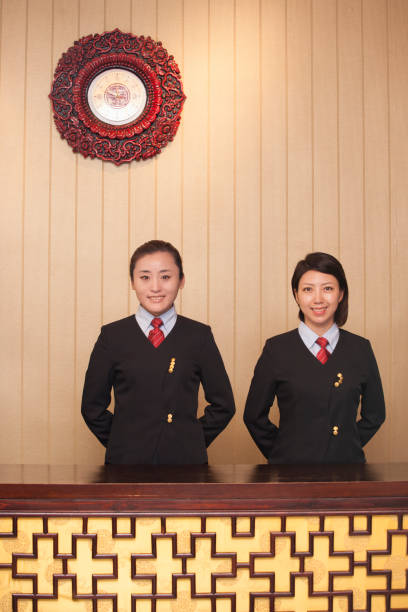 istock Chinese women working in hotel lobby 1083119280