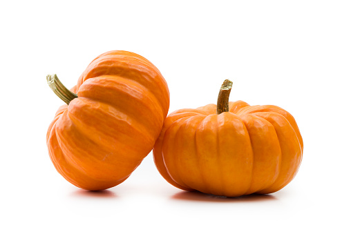 Fresh orange miniature pumpkin isolated on white background