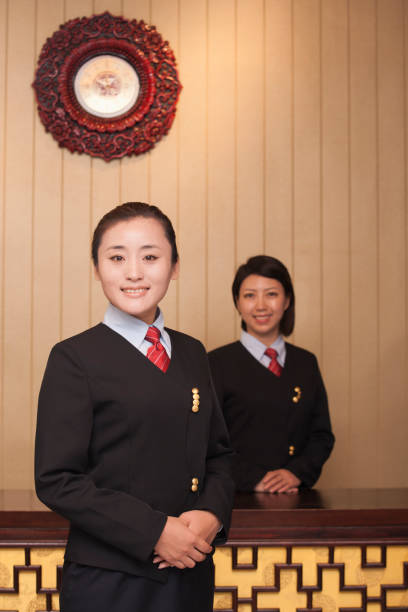 istock Chinese women working in hotel lobby 1083119398