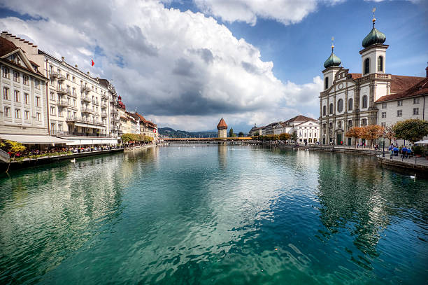 istock River between two sides of a town with blue skies 108311977