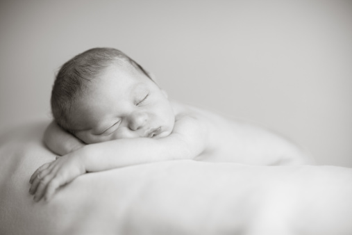 Black and white photo of a newborn baby sleeping peacefully on a soft blanket.\n\n[url=http://www.istockphoto.com/file_search.php?action=file&lightboxID=2035500][IMG]http://www.ideabugmedia.com/istock/newborn_c.jpg[/IMG][/url]\n\n[url=http://www.istockphoto.com/file_search.php?action=file&lightboxID=2248567][IMG]http://www.ideabugmedia.com/istock/newborn_bw.jpg[/IMG][/url]\n\n[url=http://www.istockphoto.com/file_search.php?action=file&lightboxID=1009716][IMG]http://www.artisticcaptures.com/familyconcepts_c.jpg[/IMG][/url]\n\n[url=http://www.istockphoto.com/file_search.php?action=file&lightboxID=748394][IMG]http://www.artisticcaptures.com/bw_tenderness.jpg[/IMG][/url]\n\n[url=http://www.istockphoto.com/file_search.php?action=file&lightboxID=3407642][IMG]http://www.ideabugmedia.com/istock/baby_items.jpg[/IMG][/url]