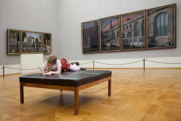 Girl at the museum stock photo