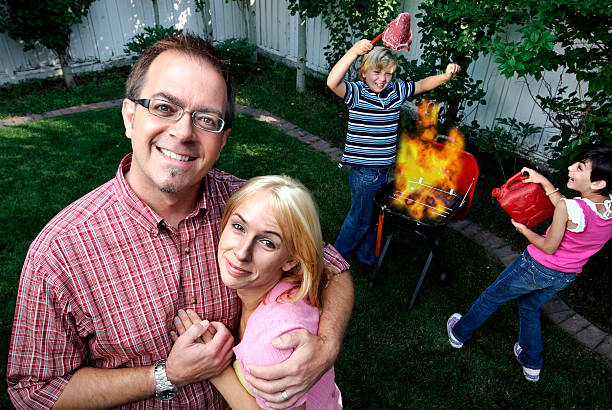 Family Barbeque  photo bomb stock pictures, royalty-free photos & images