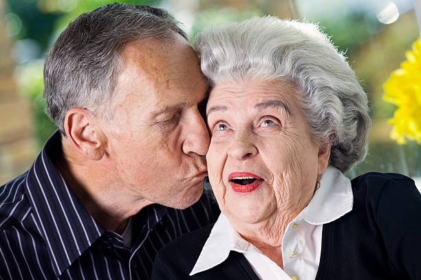 istock Senior Man Kissing a Woman 108312501