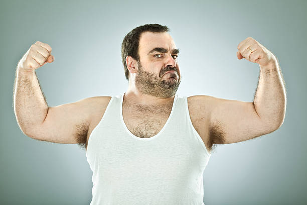 フールマチョ男性 - flexing muscles men human muscle human arm ストックフォトと画像