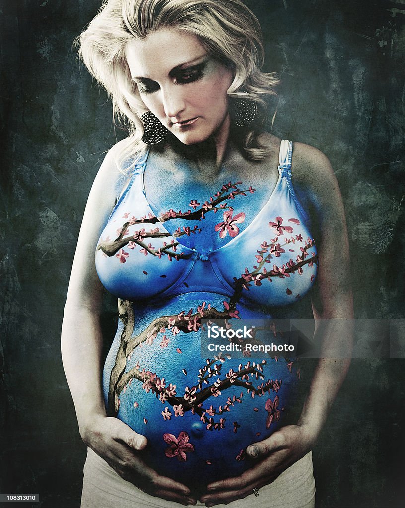 Beautiful Pregnant Woman: Cherry Blossom Body Paint  Adult Stock Photo