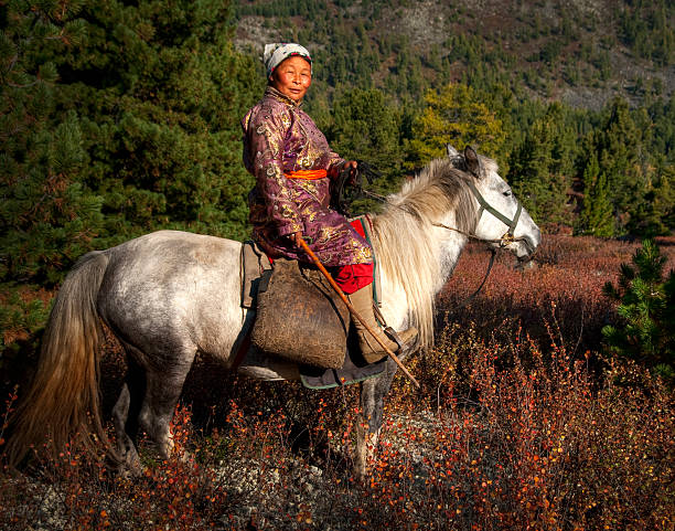 istock Mongolian Tsaatan Lady with her horse 108313365