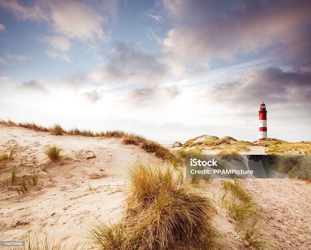 Phare dans les dunes - Photo de Partie allemande de la Mer du Nord libre de droits