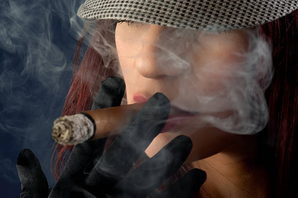 istock Woman smoking cigar 108313639