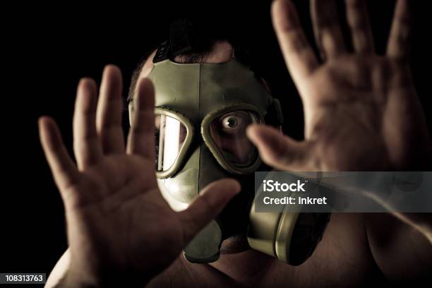 Man With A Gas Mask Stock Photo - Download Image Now - Poisonous, Wind, Tear Gas