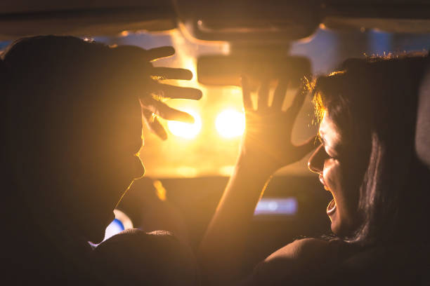 istock The couple drive a car in emergency situation. evening night time 1083140104