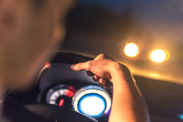 istock The man drive a car. evening night time 1083140118