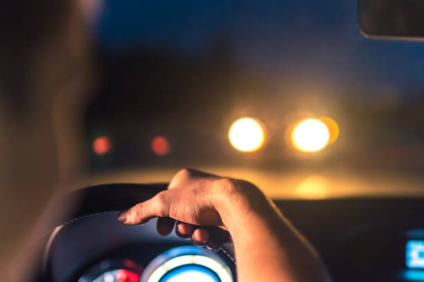 istock The man drive a car. evening night time 1083140124