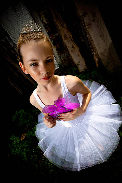 spettacolare giovane principessa con un fiore - child portrait fine art portrait multi colored foto e immagini stock