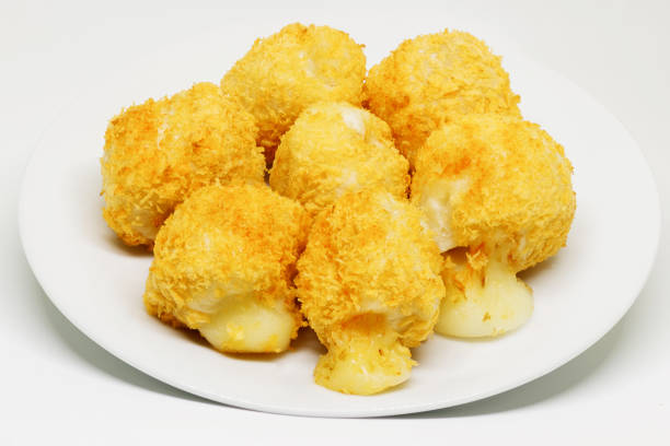 fried cheese balls - cheese breaded and deep fried on white dish. fast food concept. - 5599 imagens e fotografias de stock