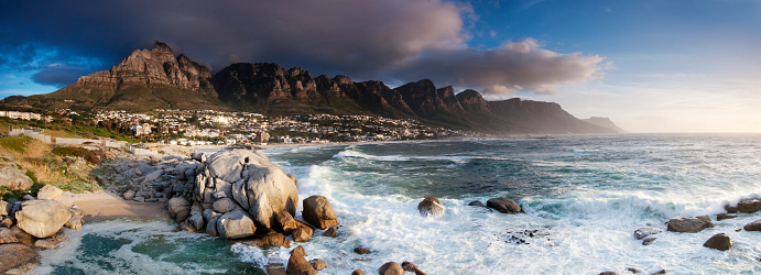 A late afternoon panoramic of the Twelve Apostles and Camps Bay in Cape Town.