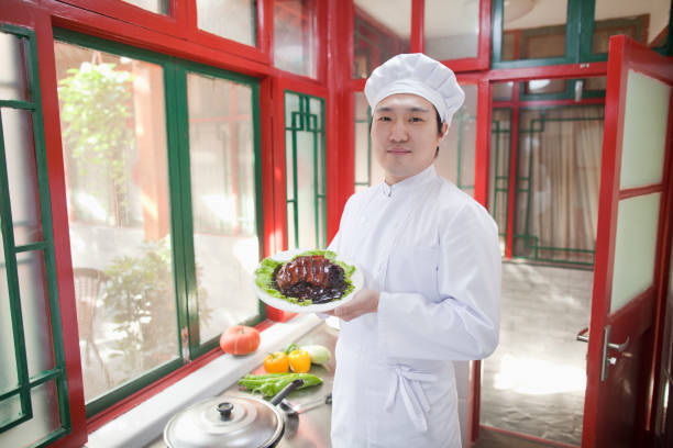 Latin chef wearing an apron and black gloves, skillfully preparing delicious mexican food in a bustling food truck kitchen