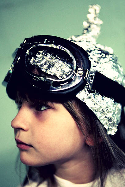 profile of child in tin foil hat  tin foil hat stock pictures, royalty-free photos & images