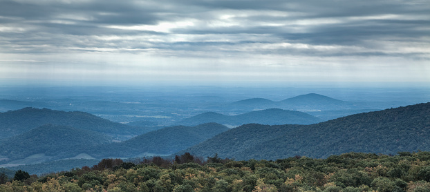 A grey threatening sky casts darkness over the Blue Ridge Mountains and valleys, an indicator rain may soon fall. Photo taken on the Skyline Drive in Shenandoah National Park.  \n\nHDR image from multiple exposures, brings out the subtle textures in the hills.\n\nI invite you to view some of my other mountain Vista Photos:\n\n[url=/file_search.php?action=file&lightboxID=8175269/#1c915b0b][img]/file_thumbview_approve.php?size=1&id=11182987[/img][/url] [url=/file_search.php?action=file&lightboxID=8175269/#1c915b0b][img]/file_thumbview_approve.php?size=1&id=11144552[/img][/url] [url=/file_search.php?action=file&lightboxID=8175269/#1c915b0b][img]/file_thumbview_approve.php?size=1&id=10989947[/img][/url] \n\n[url=/file_search.php?action=file&lightboxID=8175269/#1c915b0b][img]/file_thumbview_approve.php?size=1&id=12304012[/img][/url] [url=/file_search.php?action=file&lightboxID=8175269/#1c915b0b][img]/file_thumbview_approve.php?size=1&id=12079334[/img][/url] [url=/file_search.php?action=file&lightboxID=8175269/#1c915b0b][img]/file_thumbview_approve.php?size=1&id=11089776[/img][/url] \n\n[url=/file_search.php?action=file&lightboxID=8175269/#1c915b0b][img]/file_thumbview_approve.php?size=1&id=10989782[/img][/url] [url=/file_search.php?action=file&lightboxID=8175269/#1c915b0b][img]/file_thumbview_approve.php?size=1&id=7718488[/img][/url] [url=/file_search.php?action=file&lightboxID=8175269/#1c915b0b][img]/file_thumbview_approve.php?size=1&id=10990072[/img][/url]