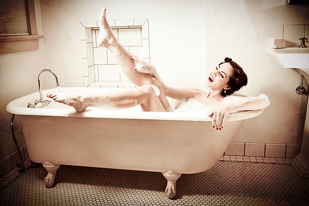 Retro Bathtub Pinup Kiss  40s pin up girls stock pictures, royalty-free photos & images