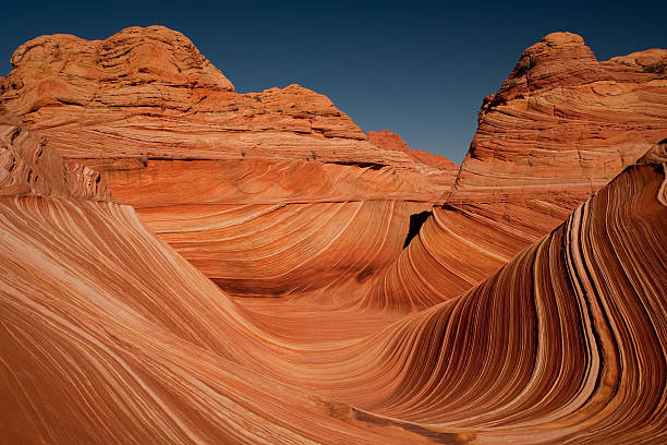 The Wave at Coyote Buttes with Swirling Shapes  coyote buttes stock pictures, royalty-free photos & images