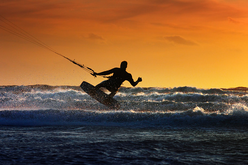 Male kitesurfer jumping in sunset.
At the big blue ocean. Waves in action. Processed from 16BIT RAW. XXXL image available.

See similar images from same session:
[url=http://www.istockphoto.com/stock-photo-10940165-kite-surfer-in-action.php?st=1de309d][img]http://i.istockimg.com/file_thumbview_approve/10940165/1/stock-photo-10940165-kite-surfer-in-action.jpg[/img][/url] [url=http://www.istockphoto.com/stock-photo-13101145-jump-into-the-sun.php?st=d1be864][img]http://i.istockimg.com/file_thumbview_approve/13101145/1/stock-photo-13101145-jump-into-the-sun.jpg[/img][/url] [url=http://www.istockphoto.com/stock-photo-10920113-the-kiteboarder.php?st=d1be864][img]http://i.istockimg.com/file_thumbview_approve/10920113/1/stock-photo-10920113-the-kiteboarder.jpg[/img][/url] [url=http://www.istockphoto.com/stock-photo-11146445-kite-boarding.php?st=d1be864][img]http://i.istockimg.com/file_thumbview_approve/11146445/1/stock-photo-11146445-kite-boarding.jpg[/img][/url] [url=http://www.istockphoto.com/stock-photo-10984743-the-windsurfer.php?st=1de309d][img]http://i.istockimg.com/file_thumbview_approve/10984743/1/stock-photo-10984743-the-windsurfer.jpg[/img][/url] [url=http://www.istockphoto.com/stock-photo-10941498-let-us-surf.php?st=3aad747][img]http://i.istockimg.com/file_thumbview_approve/10941498/1/stock-photo-10941498-let-us-surf.jpg[/img][/url] [url=http://www.istockphoto.com/stock-photo-11146483-female-kite-surfer.php][img]http://i.istockimg.com/file_thumbview_approve/11146483/1/stock-photo-11146483-female-kite-surfer.jpg[/img][/url] [url=http://www.istockphoto.com/stock-photo-10987798-surfers-quest.php][img]http://i.istockimg.com/file_thumbview_approve/10987798/1/stock-photo-10987798-surfers-quest.jpg[/img][/url]

See more Kite & Windsurfing photos::
[url=http://www.istockphoto.com/file_search.php?action=file&lightboxID=8417650 t=_blank][img]http://www.pirayastudios.com/sjoeman_surfinglb.jpg[/img][/url]