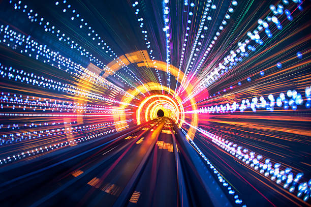 Light Tunnel Speed  tunnel stock pictures, royalty-free photos & images