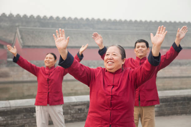 Chinese people practicing taiji in park