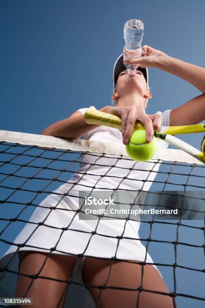 Female Tennis Player Drinking Water Stock Photo - Download Image Now - 20-24 Years, 25-29 Years, Adult