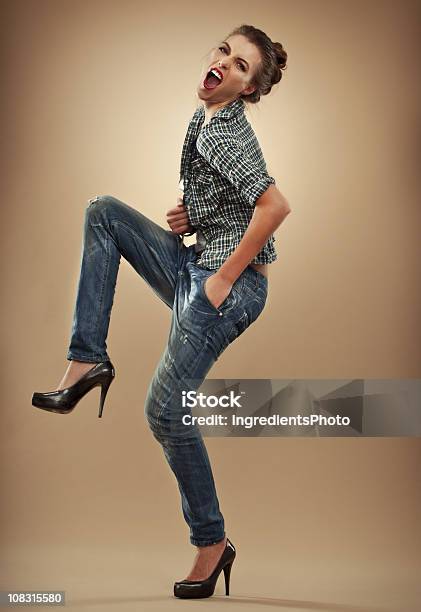 Fashion Portrait Of Young And Happy Woman On Cappuccino Background Stock Photo - Download Image Now