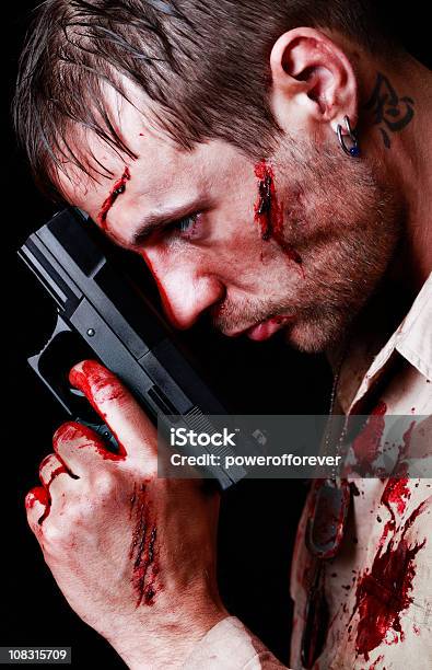 Bloody Soldier Holding Gun Stock Photo - Download Image Now - Adult, Adults Only, Armed Forces