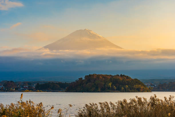 istock Beautiful landscape of mountain fuji with maple leaf tree around lake 1083159372