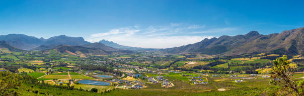 istock Franschhoek valley panorama with its famous wineries and surrounding mountains 1083159704
