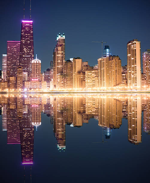 istock Chicago Skyline Reflected on Lake Michigan at Night 108316005